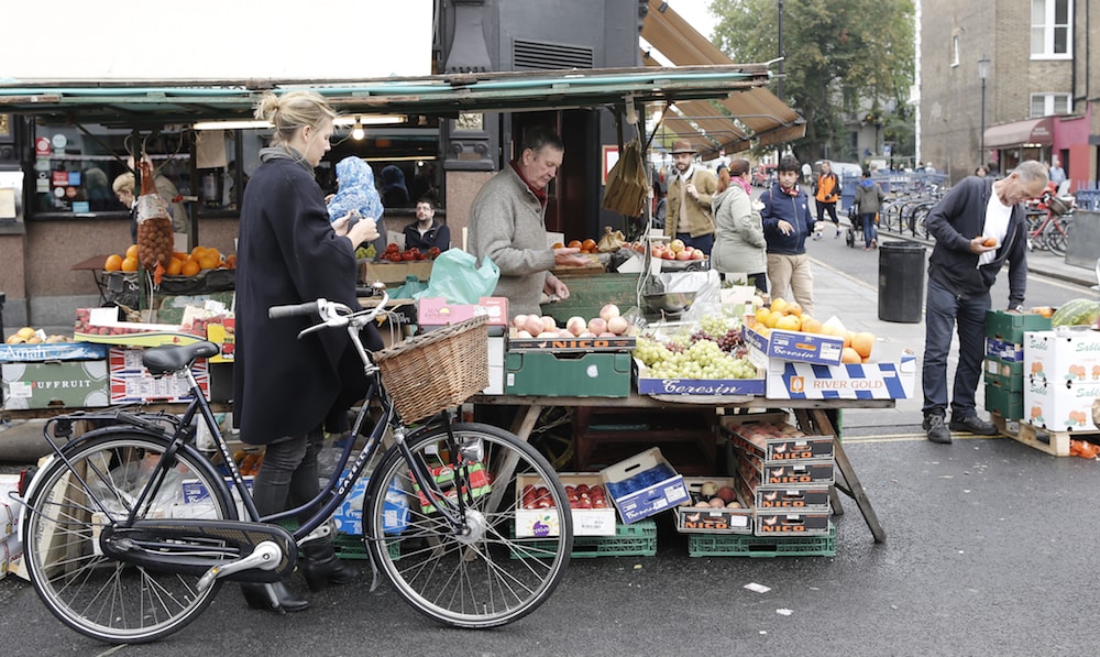 a lady at a market stall