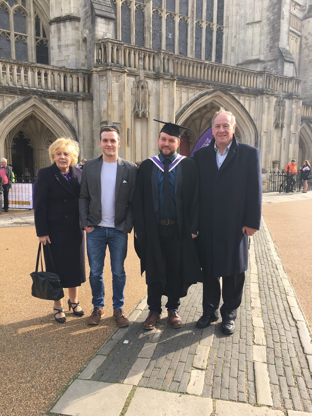This is photo of Harry and his family at his brother's graduation