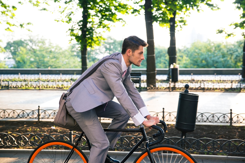 This is photo of a man riding his bike to work