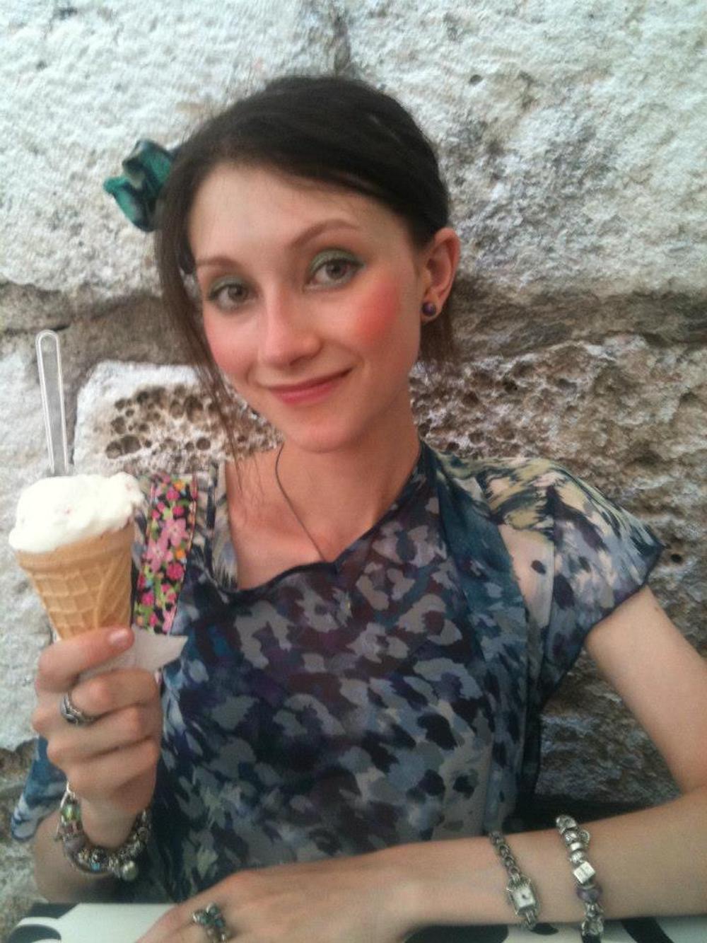 This is photo of Marissa holding an ice cream 