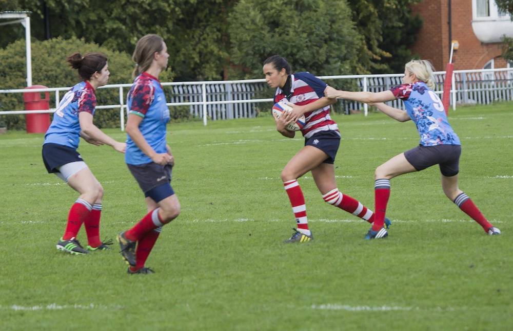 Laura playing rugby