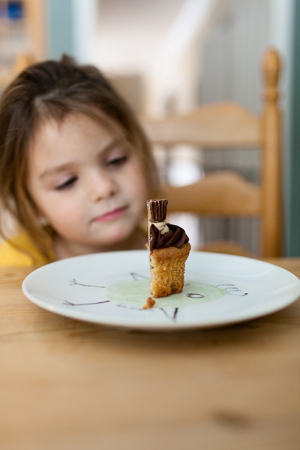 child looking at cake