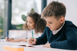 two-children-work-in-classroom-2