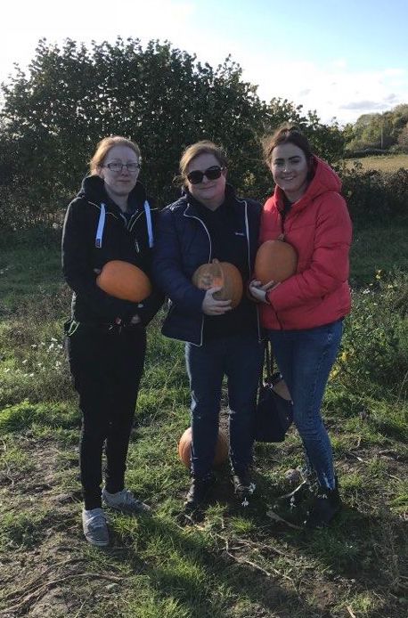 Rosie pumpkin picking with her family