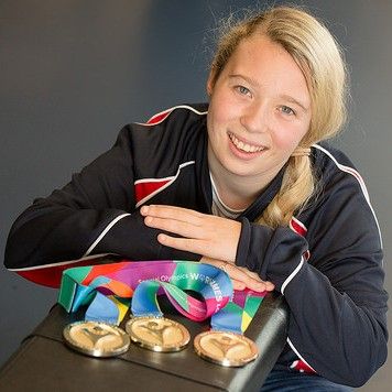 Kiera-with-her-gold-medals-2-