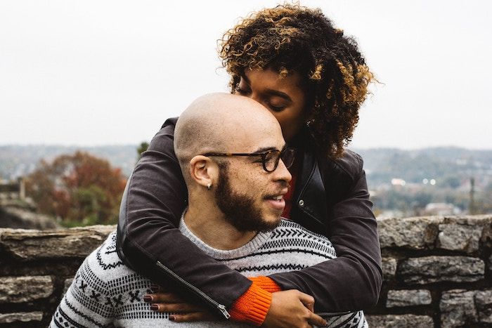 Young-Couple-Holding-Each-Other