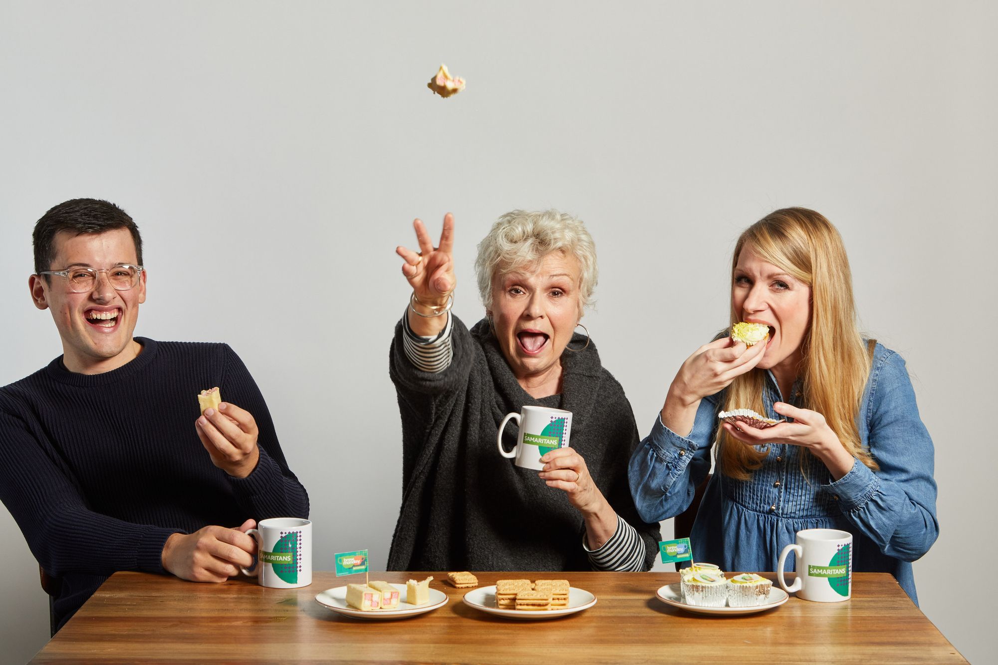 Michael Chakraverty, Dame Julie Walters and Rachel Parris share a cup of tea and cake together in support of Brew Monday