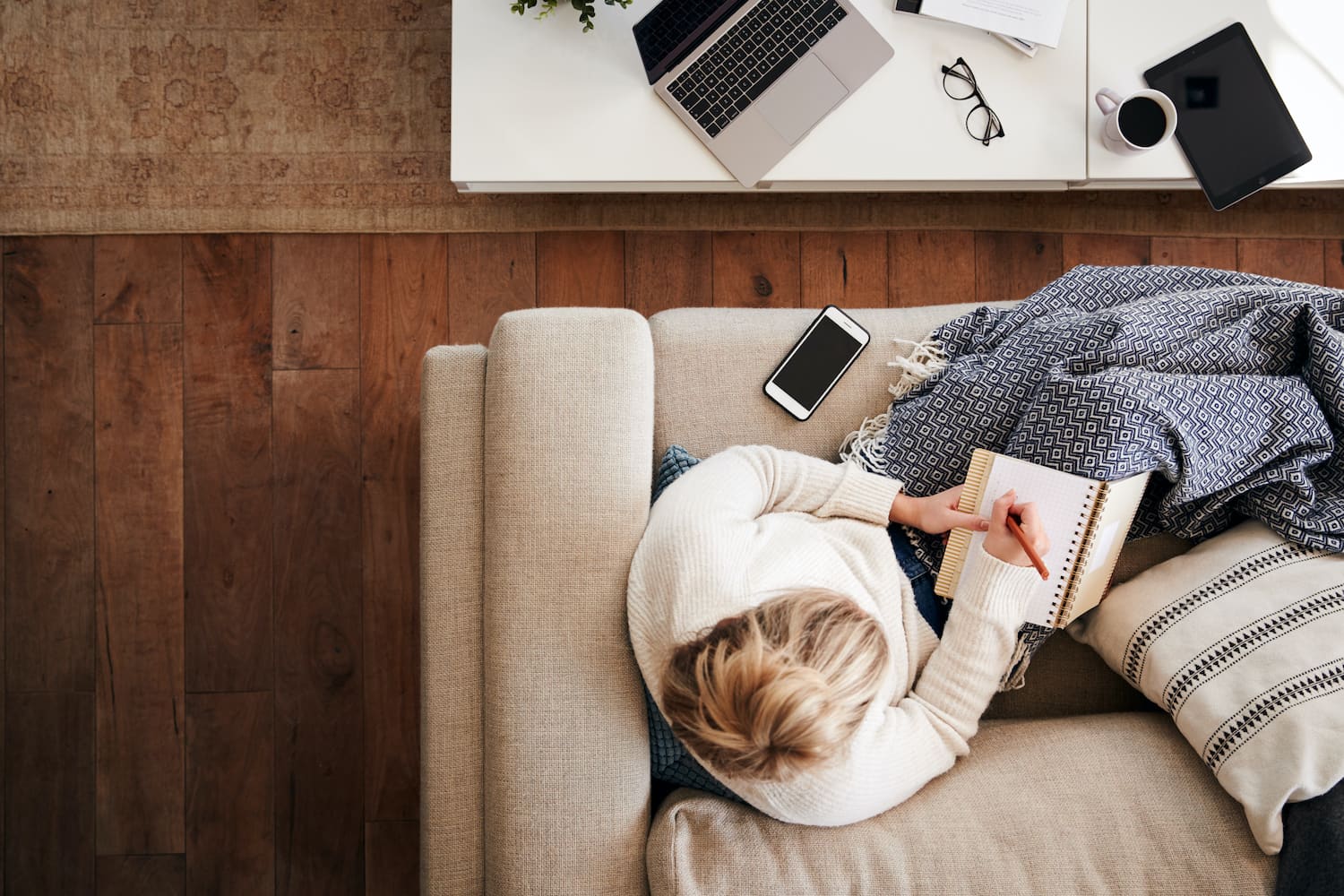 Woman writing in journal