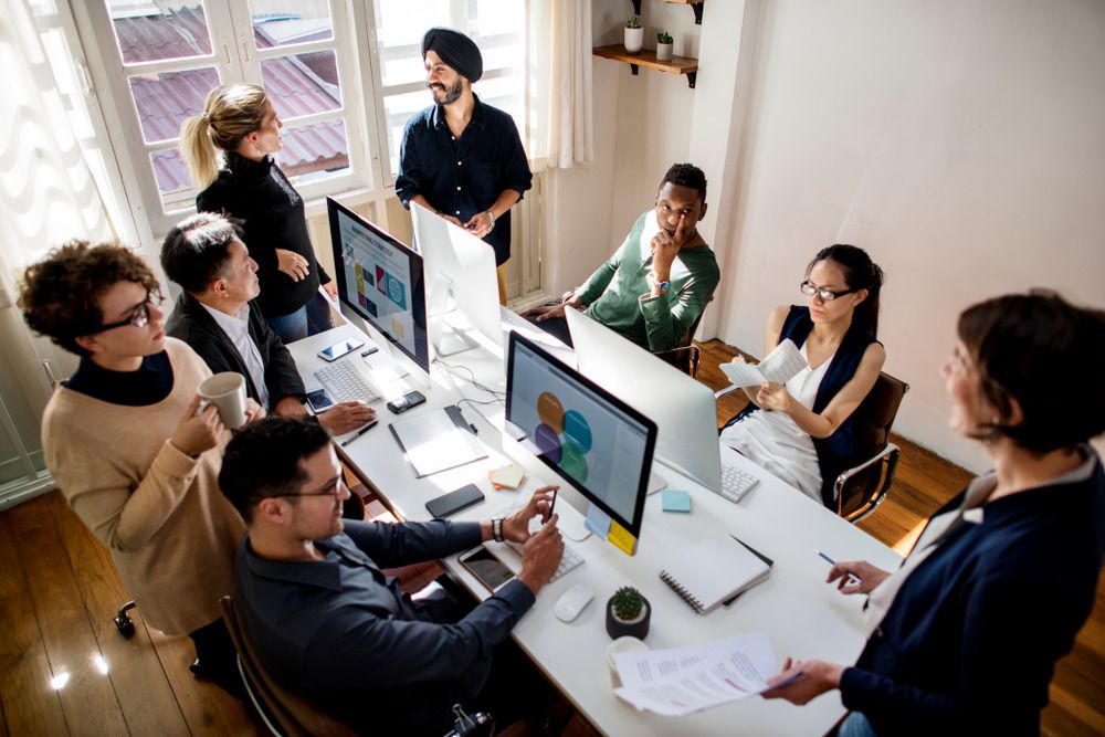 group of people working at an office