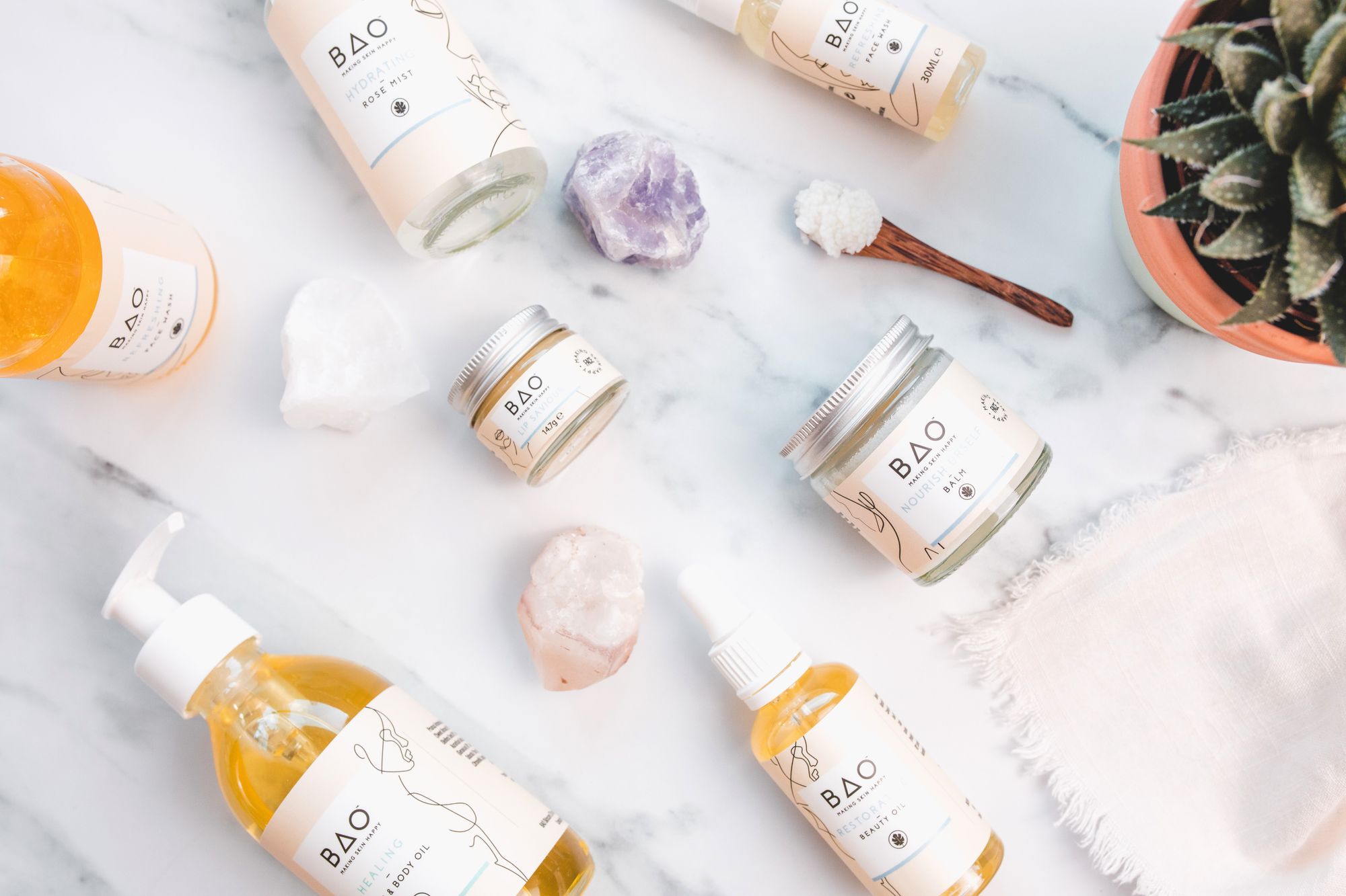 Bottles and pots from the skincare range at BAO