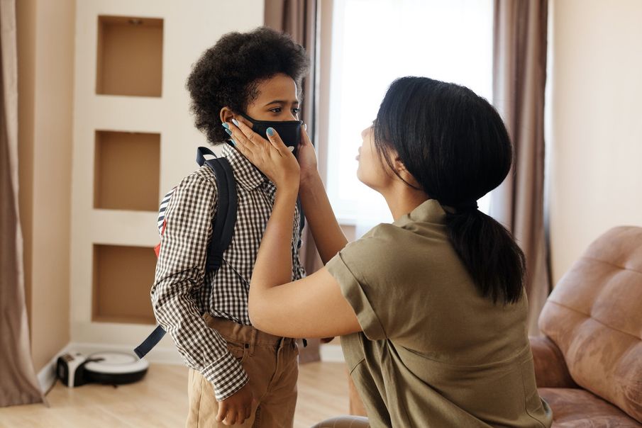 Can students and teachers wear face coverings at school?