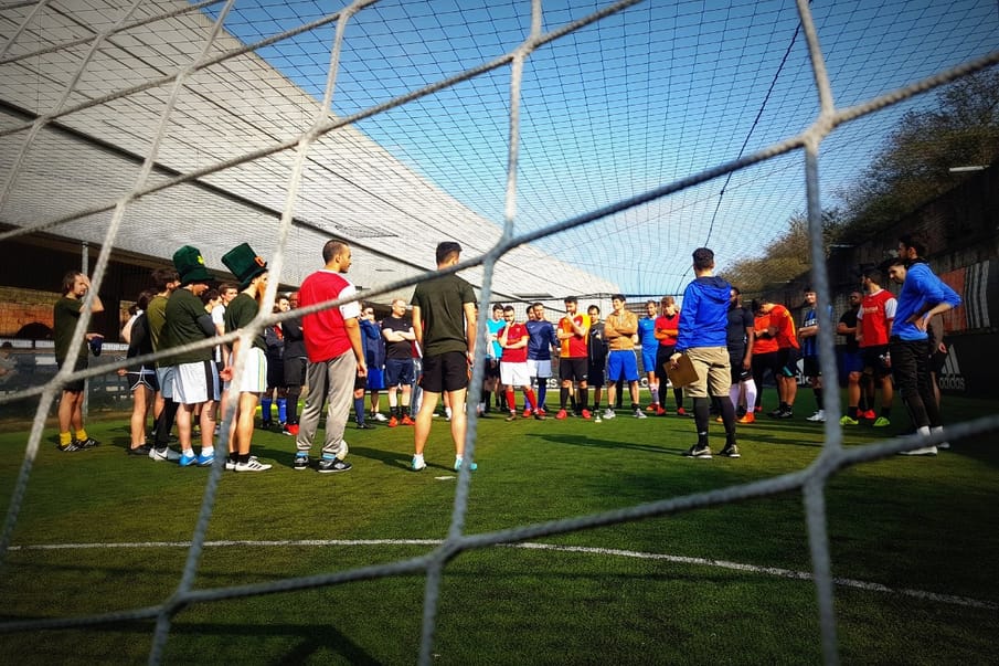 How adult football lessons are helping one community navigate life’s challenges